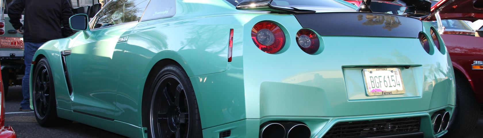 A Sea Foam Green Nissan GTR (Driven by a 16 Year Old That Purchased It)