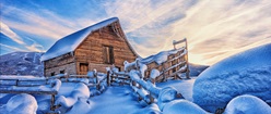 Log Cabin in the Snow