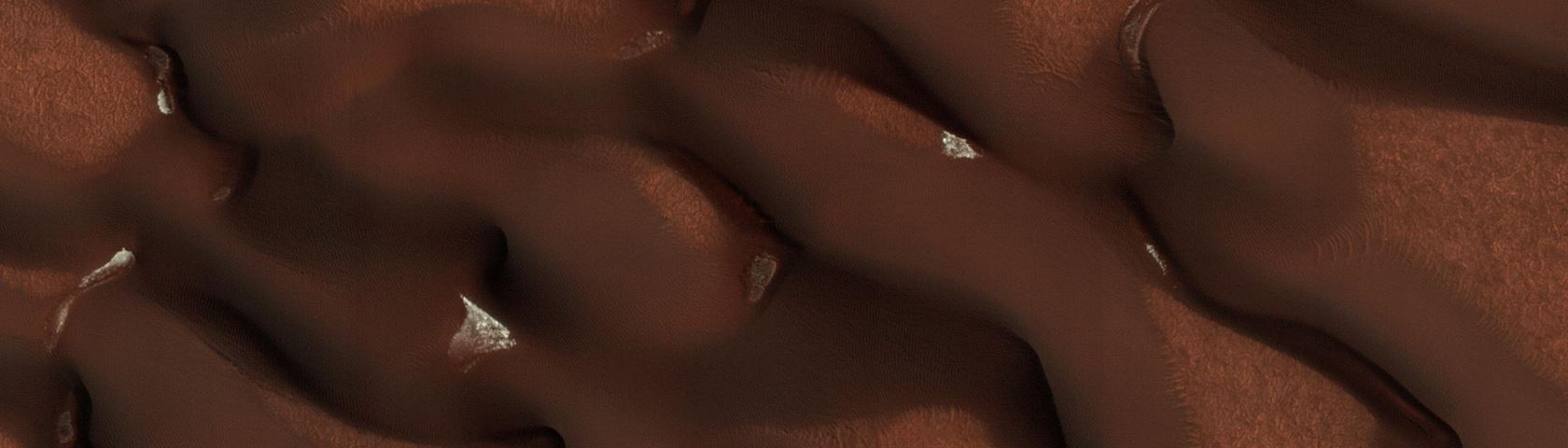 Patches of Snow on Mars Dunes
